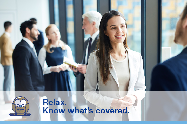 A bunch of business people in the lobby of a building, with a young woman in a white suit the foreground talking to a man. Image caption "Relax. Know what's covered" next to an illustration of an owl.