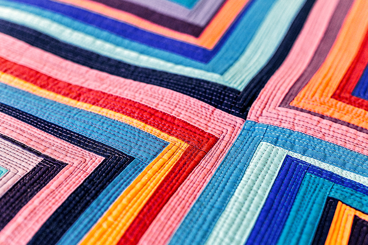 A beautiful multi-coloured quilt.